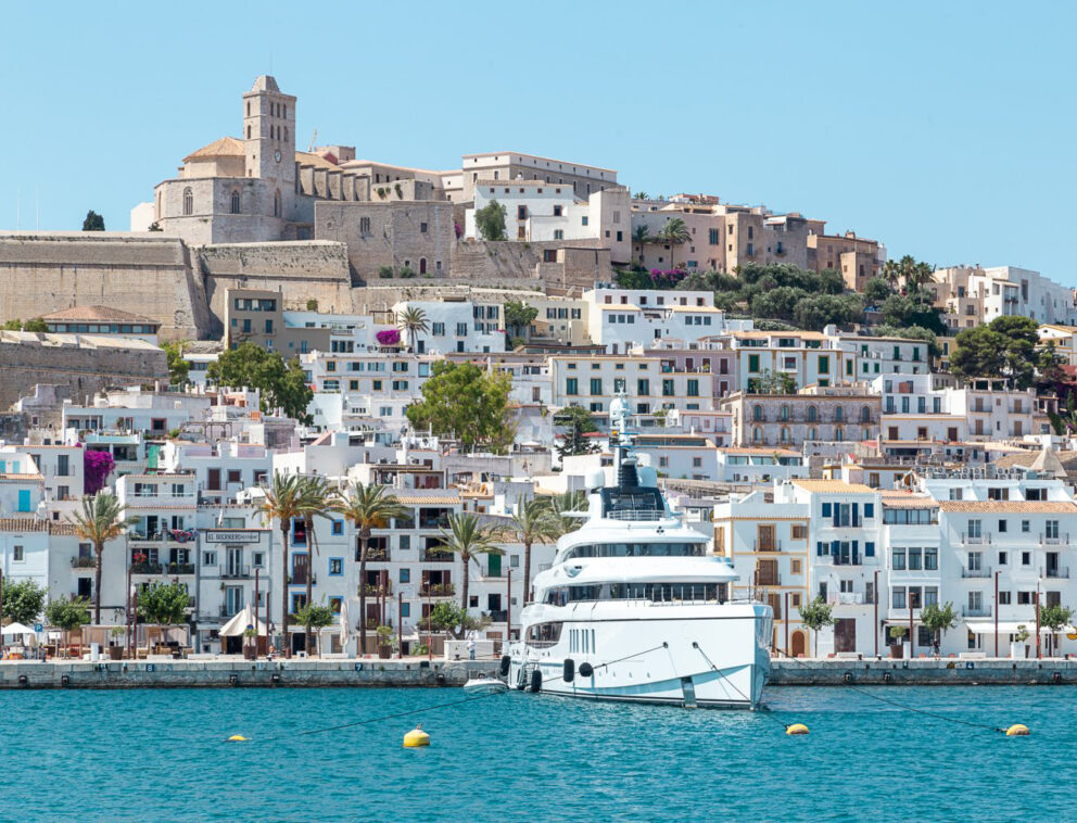 Marina Ibiza port with a yacht moored by the dock