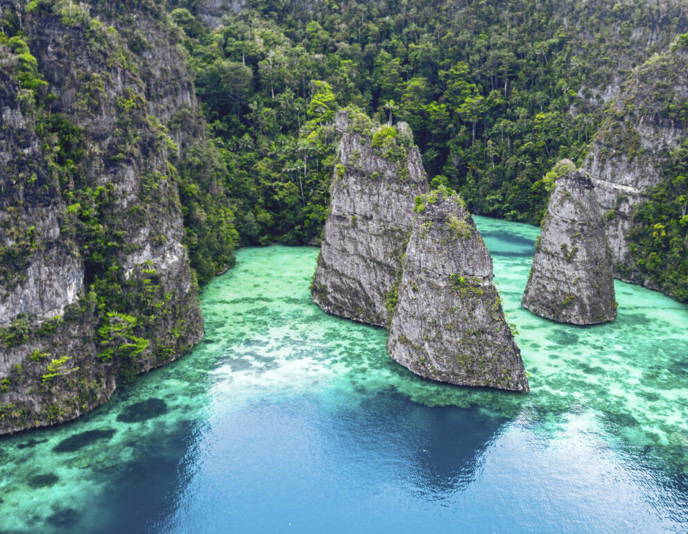 Scenic view of Balbulol, Misool in Raja Ampat, with limestone karsts rising from turquoise waters.