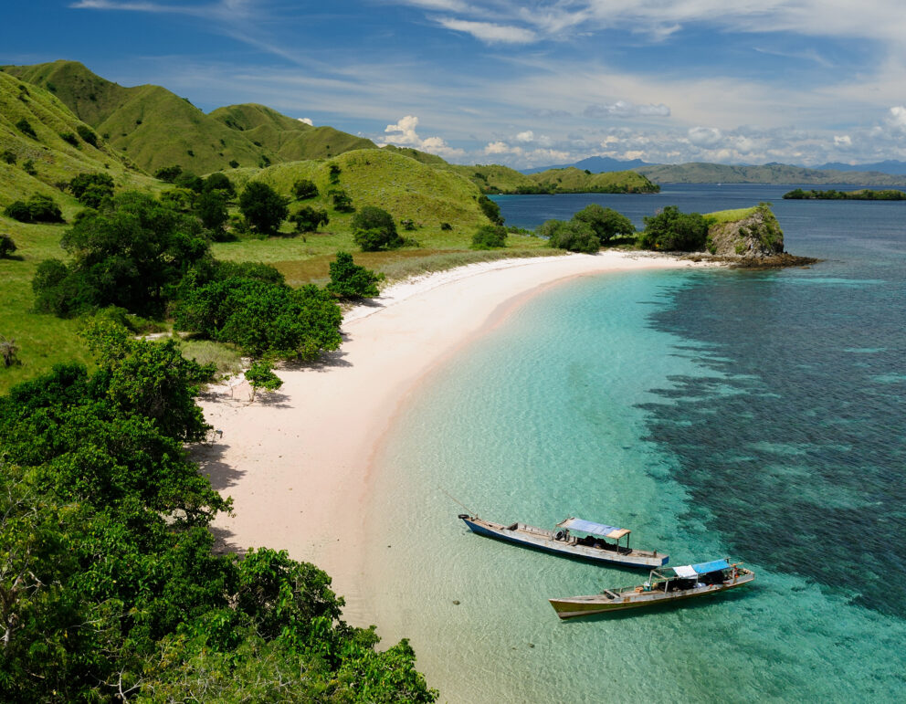 Remote beach near Labuan Bajo with white sand and calm waters