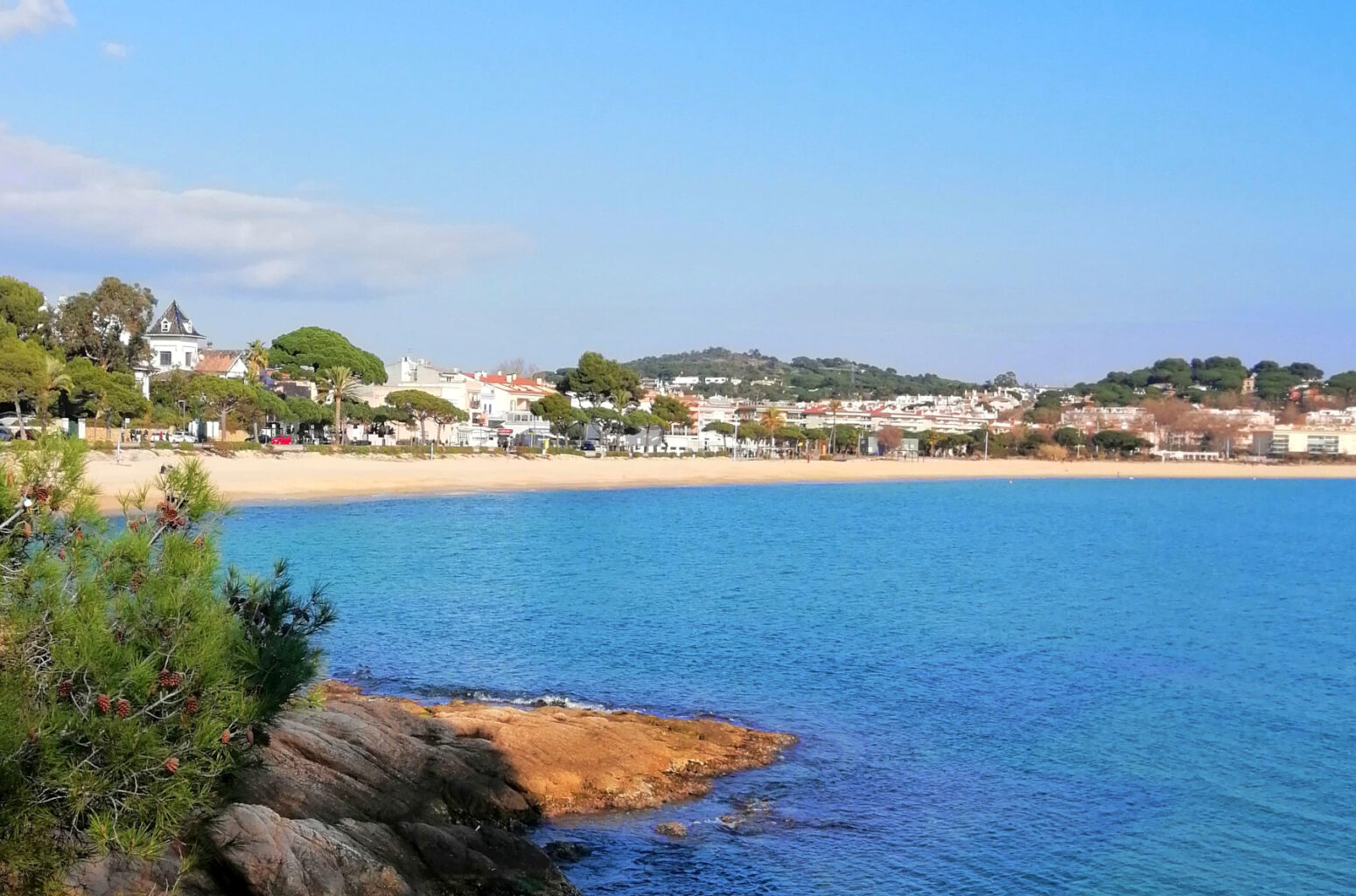 Sant Pol beach in Sant Feliu de Guíxols with calm blue water