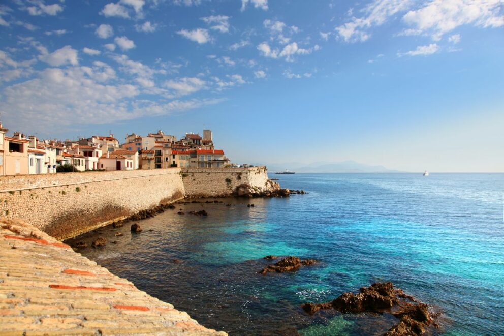 Antibes old city surrounded by blue clear water