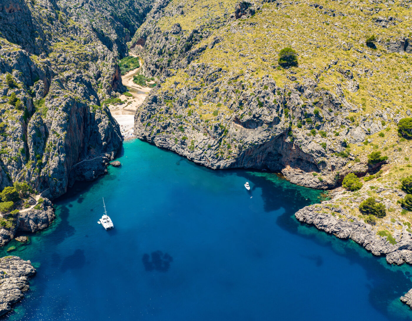Sa Calobra with two catamarans anchored between cliffs