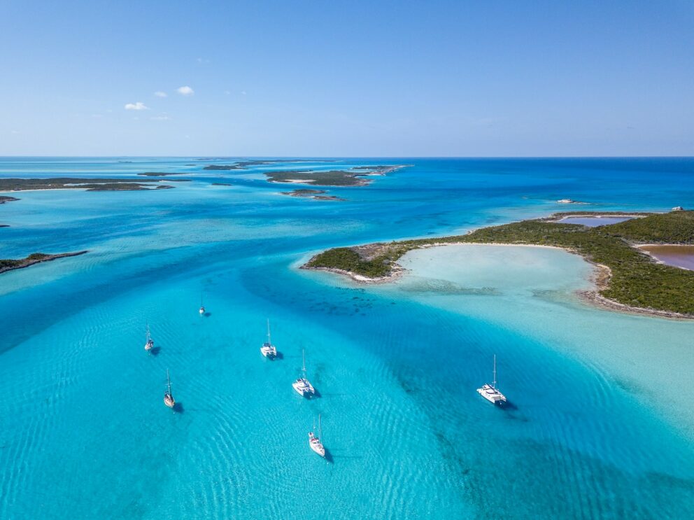 Luxury catamarans cruising the turquoise waters of the Exumas, Bahamas