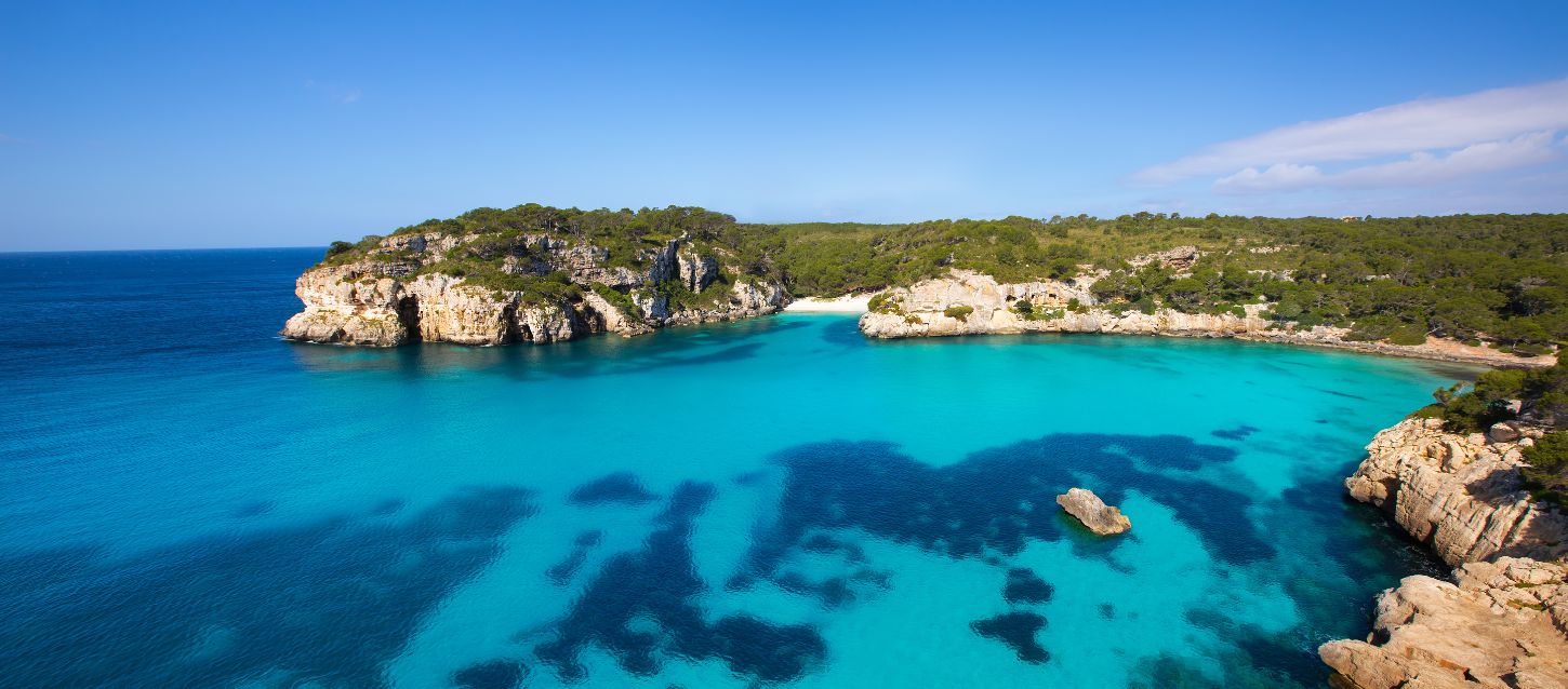 turquoise waters of Cala Macarella, famous in Menorca