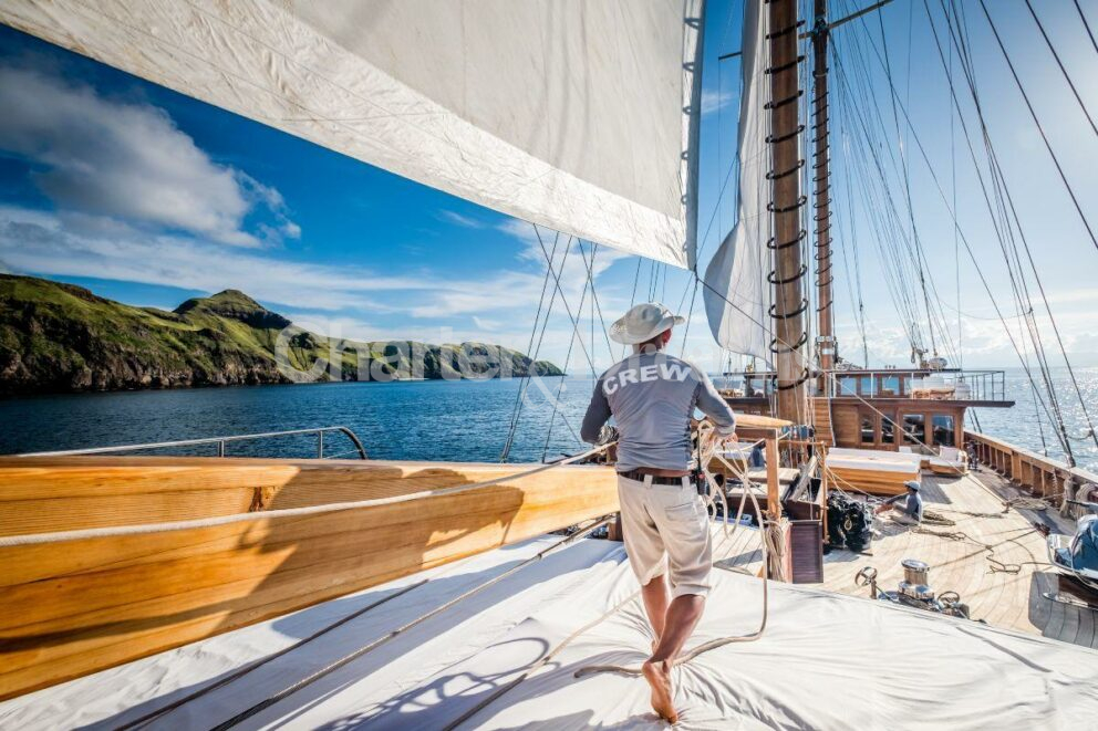 Lamima yacht crew preparing the sails onboard