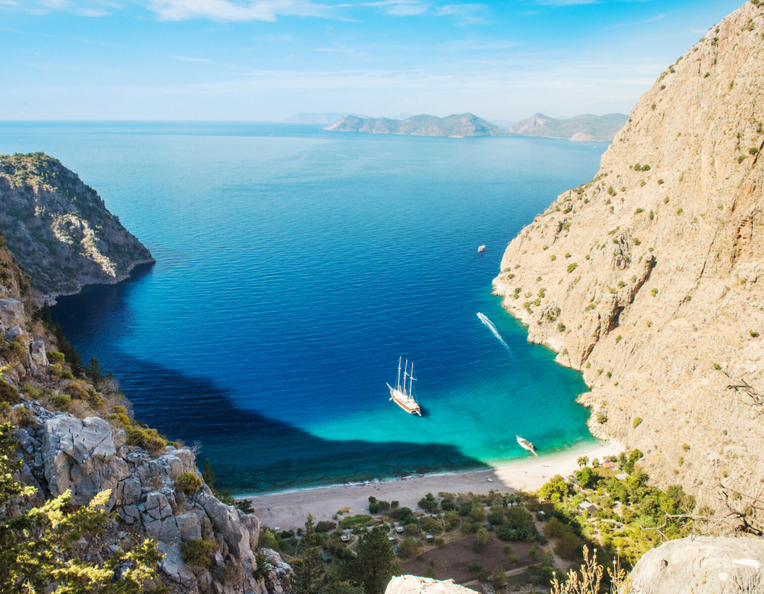 Butterfly Valley, dramatic cliffs and turquoise bay seen from above