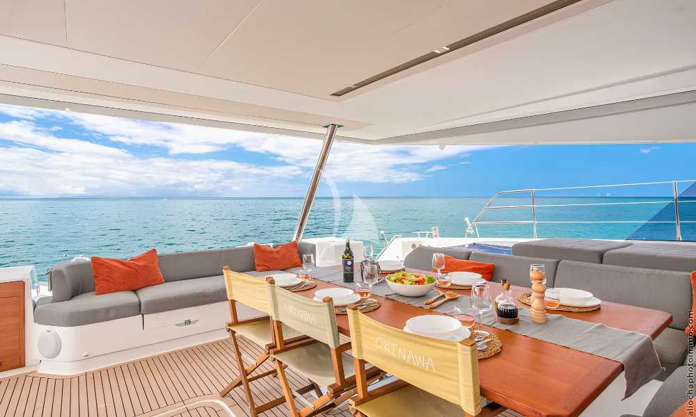 OKINAWA catamaran aft dining table set for a group